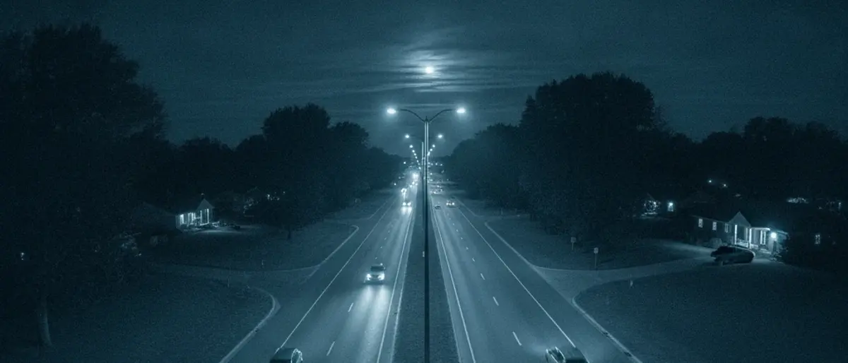 Open road with spaced vehicles crossing a detection zone one at a time